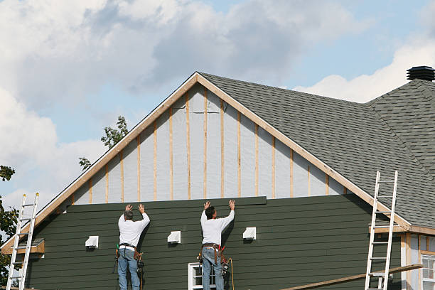Professional Siding Contractor technician working in Keasbey, NJ
